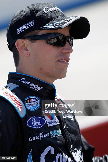 Colin Braun, driver of the Con-Way Ford, stands on the grid during qualifying for the NASCAR Nationwide Series Heluva Good 200 at Dover International...