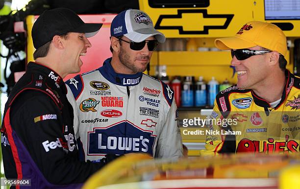Denny Hamlin, driver of the FedEx Freight Toyota, Jimmie Johnson, driver of the Lowe's Chevrolet, and Kevin Harvick, driver of the Shell/Pennzoil...