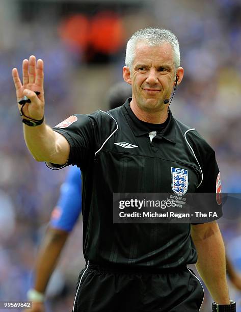 Referee Chris Foy gives a signal during the FA Cup sponsored by E.ON Final match between Chelsea and Portsmouth at Wembley Stadium on May 15, 2010 in...