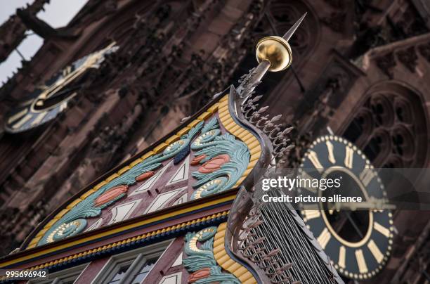 The colourful framework gable of the reconstructed 'Goldene Waage' can be seen in the newly constructed old town in front of the dome in...