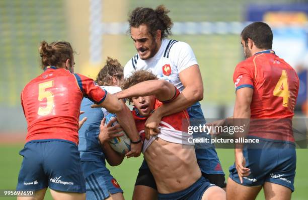 Spain's Manuel Sainz-Trapaga and France's Jonathan Laugel in action during the Oktoberfest 7s international rugby competition match between Spain and...