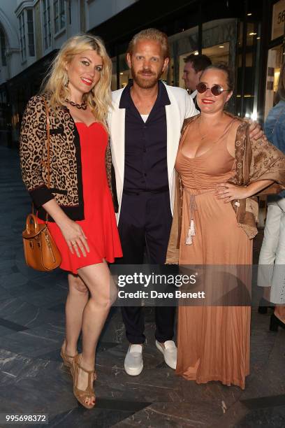 Meredith Ostrom, Alistair Guy and Erica Bergsmeds attend the La Perla x Alistair Guy "The Ultimate Summer Wardrobe" party at La Perla, Burlington...