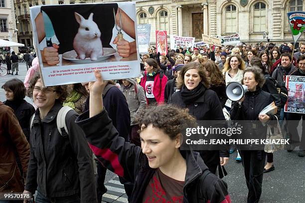 People take part in a rally of Vegetarian activists during the "Veggie pride" demonstration on May 15, 2010 in Lyon, eastern France. The event, held...