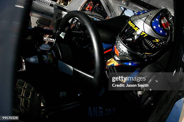 David Stremme, driver of the Air Gaurd Ford, sits in his car in the garage during practice for the NASCAR Sprint Cup Series Autism Speaks 400 at...