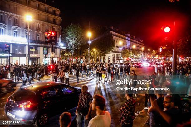 France fans celebrate after France qualifies for the final of the 2018 FIFA World Cup after their 1-0 victory over Belgium at Place de la Republique...