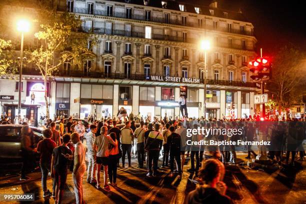 France fans celebrate after France qualifies for the final of the 2018 FIFA World Cup after their 1-0 victory over Belgium at Place de la Republique...