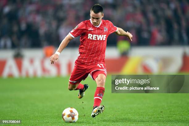 Cologne's Christian Clemens plays the ball during the Europa League match between 1.FC Cologne and Red Star Belgrade at the RheinEnergieStadium in...