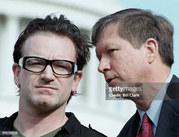Bono of U2 and Rep. John Kasich speak during a press conference on third world debt relief at the Capitol.