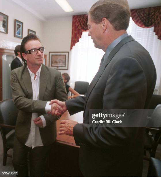 S Bono meets with Sen. Rod Grams on third world debt relief in the Senator's office.