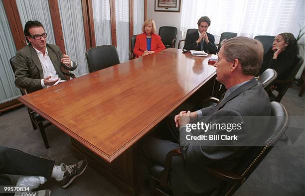 S Bono meets with Sen. Rod Grams on third world debt relief in the Senator's office.