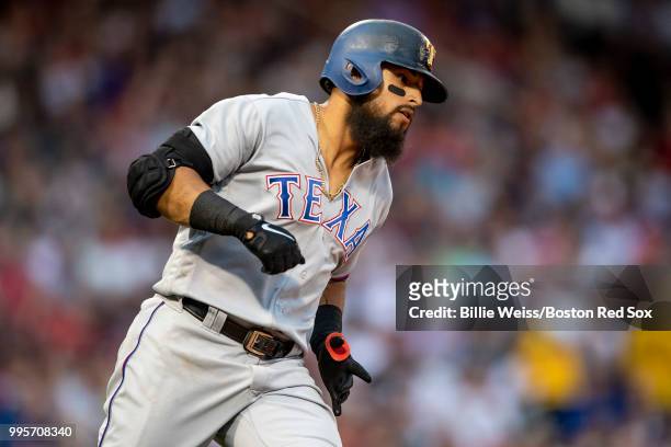 Rougned Odor of the Texas Rangers rounds the bases after hitting a solo home run during the second inning of a game against the Boston Red Sox on...
