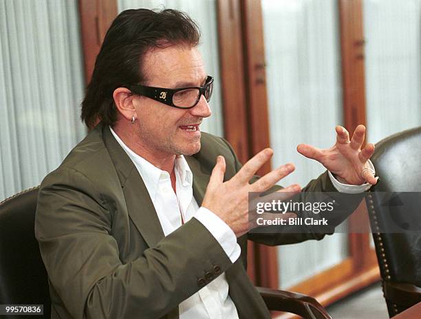 S Bono meets with Sen. Rod Grams on third world debt relief in the Senator's office.