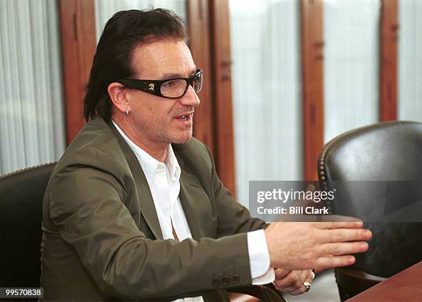 S Bono meets with Sen. Rod Grams on third world debt relief in the Senator's office.