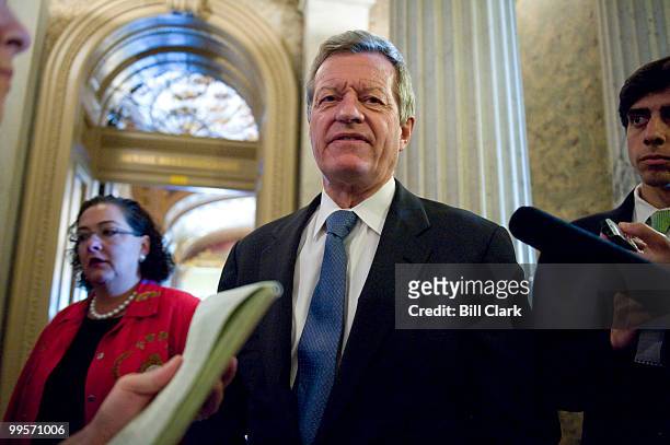 Sen. Max Baucus, D-Mont., speaks to reporters as he leaves the Senate Floor on Tuesday, July 16, 2009.