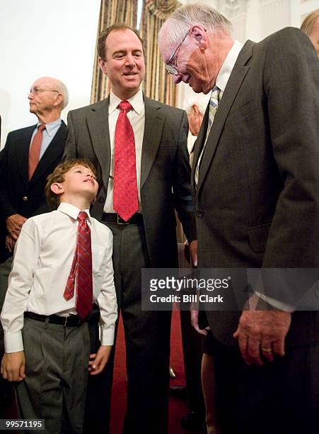 Rep. Adam Schiff, D-Calif., center, introduces his son Elijah to Apollo 11 astronaut Neil Armstrong during the tribute event to the Apollo 11...