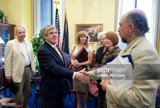 From left, writer and producer Tom Fontana, Sen. Ben Nelson, D-Neb., actress Lauren Holly, actress Tyne Daly, actress Laura Innes, and actor Richard...