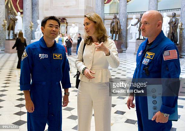 Rep. Gabrielle Giffords, D-Ariz., center, she gives a tour of Statuary Hall in the Capitol to Shuttle Discovery STS-124 astronauts Mission Specialist...