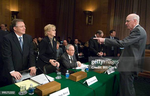 From left, John Reich, director of the Office of Thrift Supervision, JoAnn Johnson, chairman of the National Credit Union Administration, and Donald...