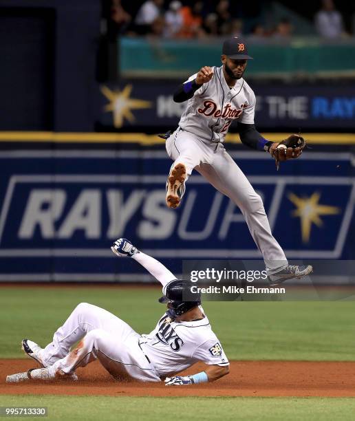 Carlos Gomez of the Tampa Bay Rays steals second as Niko Goodrum of the Detroit Tigers fields the throw in the third inning during a game at...