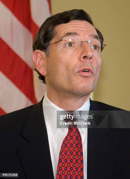 Newly designated Sen. John Barrasso, R-Wyo., speaks during a photo-op with Sen. Michael Enzi, R-Wyo., and Senate Minority Leader Mitch McConnell,...