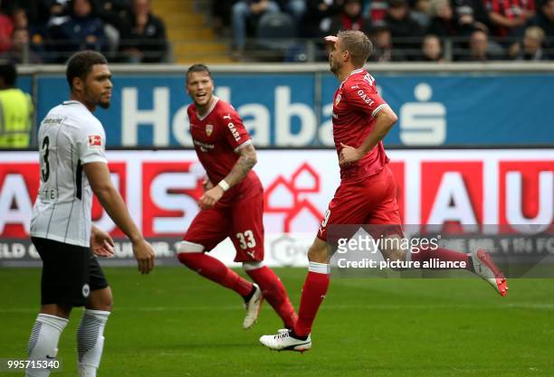 Stuttgart's Simon Terodde celebrates his equaliser goal with Daniel Ginczek during the German Bundesliga match between Eintrach Frankfurt and...