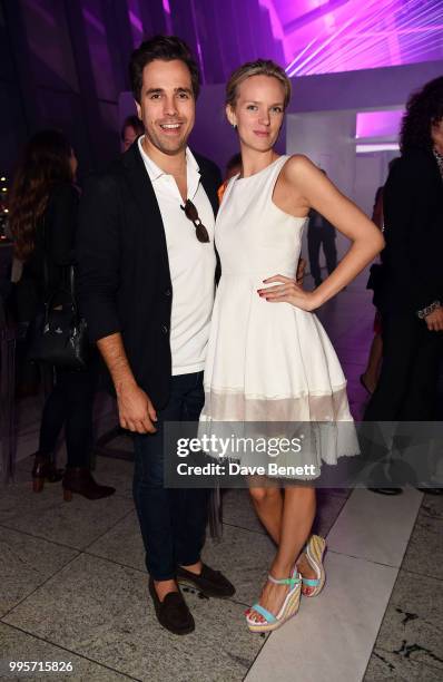 Diego Bivero-Volpe and Charlotte Carroll attend the BVLGARI MAN WOOD ESSENCE event at Sky Garden on July 10, 2018 in London, England.