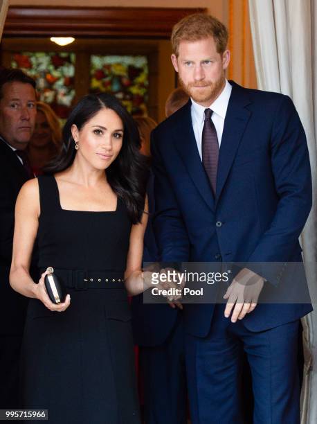 Prince Harry, Duke of Sussex and Meghan, Duchess of Sussex attend a Summer Party at the British Ambassador's residence at Glencairn House during...