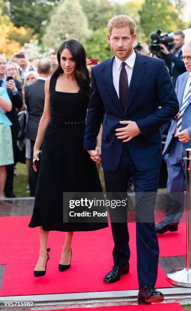 Prince Harry, Duke of Sussex and Meghan, Duchess of Sussex attend a Summer Party at the British Ambassador's residence at Glencairn House during...