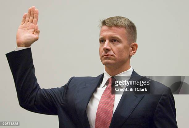 Erik Prince, chairman of the Prince Group, LLC and Blackwater USA, is sworn-in during the House Oversight and Government Reform Committee hearing on...