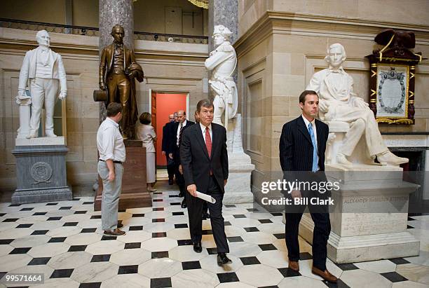 House Minority Whip Roy Blunt, R-Mo., followed by several fellow House Republicans, walk through Statuary Hall on their way to their news conference...