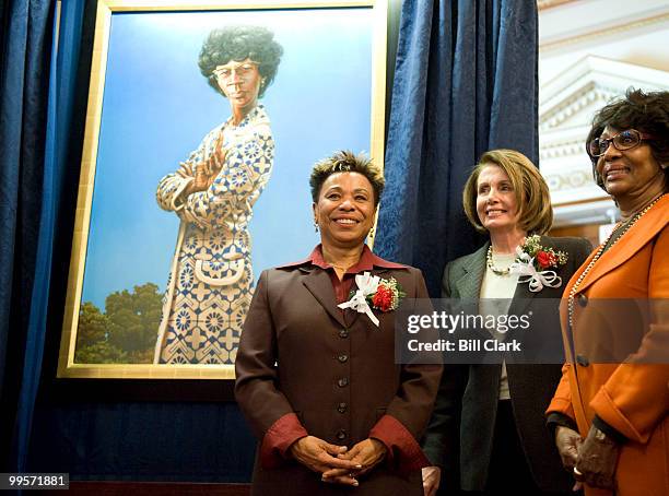 From left, Rep. Barbara Lee, D-Calif., Speaker of the House Nancy Pelosi, and Rep. Maxine Waters, D-Calif., unveil the painting of Shirley Chisolm in...