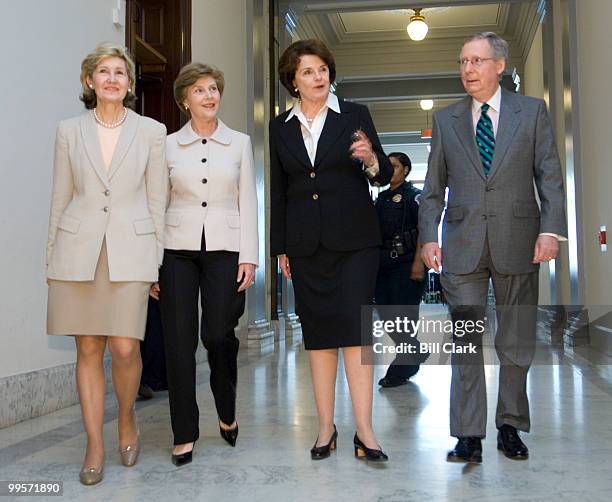 From left, Sen. Kay Bailey Hutchison, R-Texas, First Lady Laura Bush, Sen. Dianne Feinstein, D-Calif., and Senate Minority Leader Mitch McConnell,...