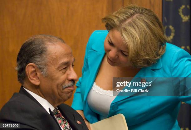 House Judicary chairman John Conyers, D-Mich., speaks with subcommittee chairwoman Linda Sanchez, D-Calif., before the House Subcommittee on...