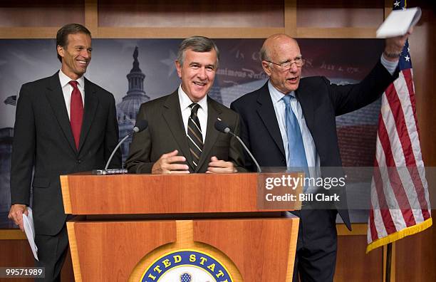 From left, Sen. John Thune, R-S. Dak., Sen. Mike Johanns, R-Neb., and Sen. Pat Roberts, R-Kan., wait for the TV lights to come on in the Senate...