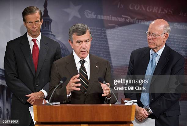 From left, Sen. John Thune, R-S. Dak., Sen. Mike Johanns, R-Neb., and Sen. Pat Roberts, R-Kan., hold a news conference on the effects of cap and...