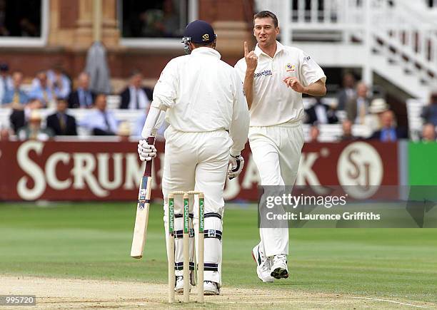 Glenn McGrath of Australia celebrates the wicket of Dominic Cork of England during the fourth day of the Second Npower Test between England and...