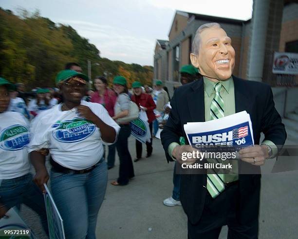 Dressed as President Bush, Patrick Crowley, of the pat-crowley.org blog, pretends to campaign for Sen. Chafee at Toll Gate High School in advance of...