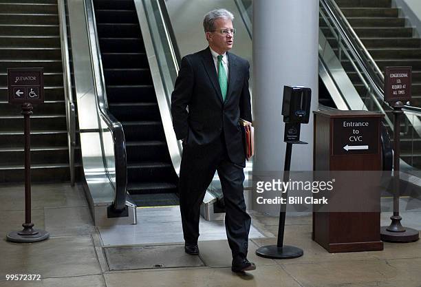 Sen. Tom Coburn, R-Okla., heads back to one of the Senate office buildings via the subway after the Senate Republican policy lunch on Tuesday, March...