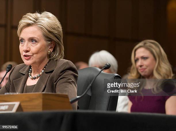 Secretary of State nominee Hillary Clinton testifies during her confirmation hearing in the Senate Foreign Relations Committee as her daughter...
