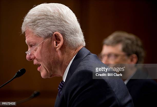 Former President Bill Clinton, chairman of the William J. Clinton Foundation, and Bill Gates, Co-Chair of the Bill and Melinda Gates Foundation,...