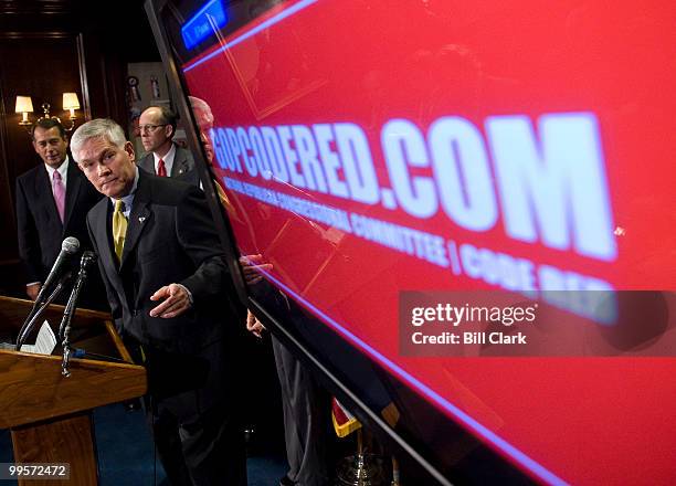 From left, House Minority Leader John Boehner, R-Ohio, NRCC chairman Pete Sessions, R-Texas, and NRCC deputy chairman Greg Walden, R-Ore., watch as...