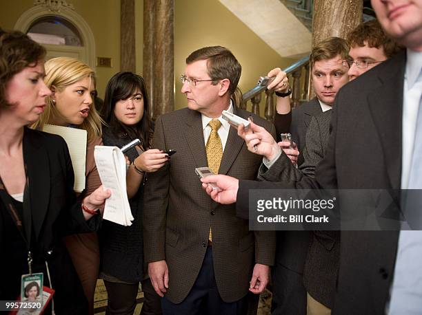 Sen. Kent Conrad, D-N. Dak., speaks with reporters as he heads to the Senate Democrats' policy lunch on Tuesday, Dec. 1, 2009.