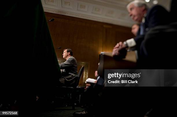 Securities and Exchange Commission Chairman Christopher Cox listens to committee members' opening statements during the Senate Banking, Housing and...