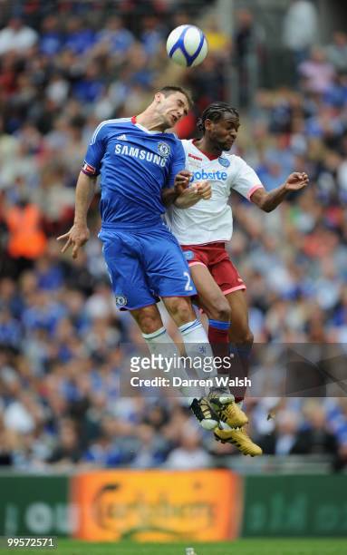 Branislav Ivanovic of Chelsea goes up for a header with Frederic Piquionne of Portsmouth during the FA Cup sponsored by E.ON Final match between...
