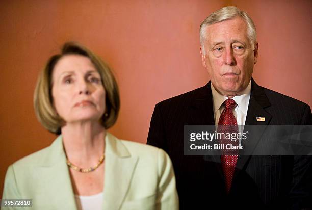 Speaker of the House Nancy Pelosi, D-Calif., and House Majority Leader Steny Hoyer, D-Md., listen as other House Democratic leaders speak at the...