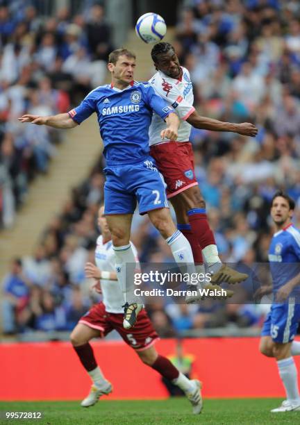 Branislav Ivanovic of Chelsea goes up for a header with Frederic Piquionne of Portsmouth during the FA Cup sponsored by E.ON Final match between...