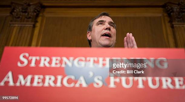 Sen. Jeff Merkley, D-Ore., speaks during a news conference to discuss the energy, education and health investments in President Obama's budget...