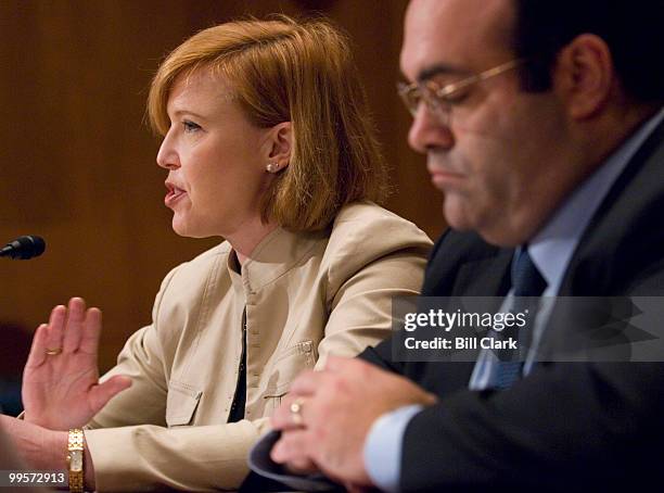 Kimberly Dozier of CBS, who was injured in Iraq, testifies with Dr. Andrew Polla, of the American Academy of Orthopaedic Surgeons, during the Senate...