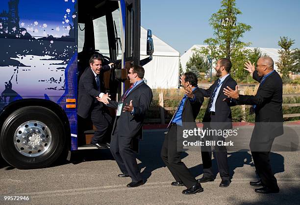 Daily Show correspondents film a spot with the Daily Show bus outside of the Pepsi Center on the first day of the Democratic National Convention in...