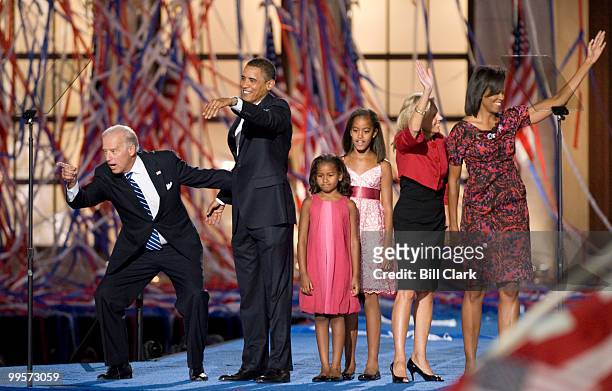 From left, Democratic vice presidential nominee Joe Biden, Democratic presidential nominee Barack Obama, Malia Obama, Sasha Obama, Biden's wife Jill...